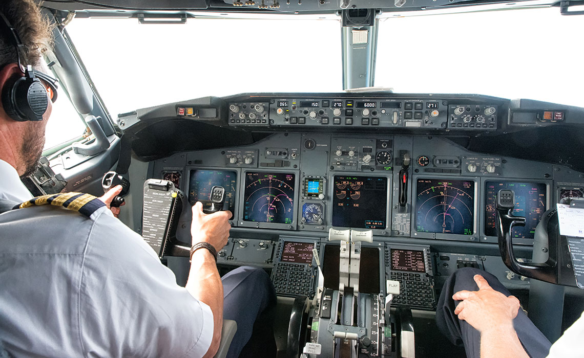 A pilot in the cockpit